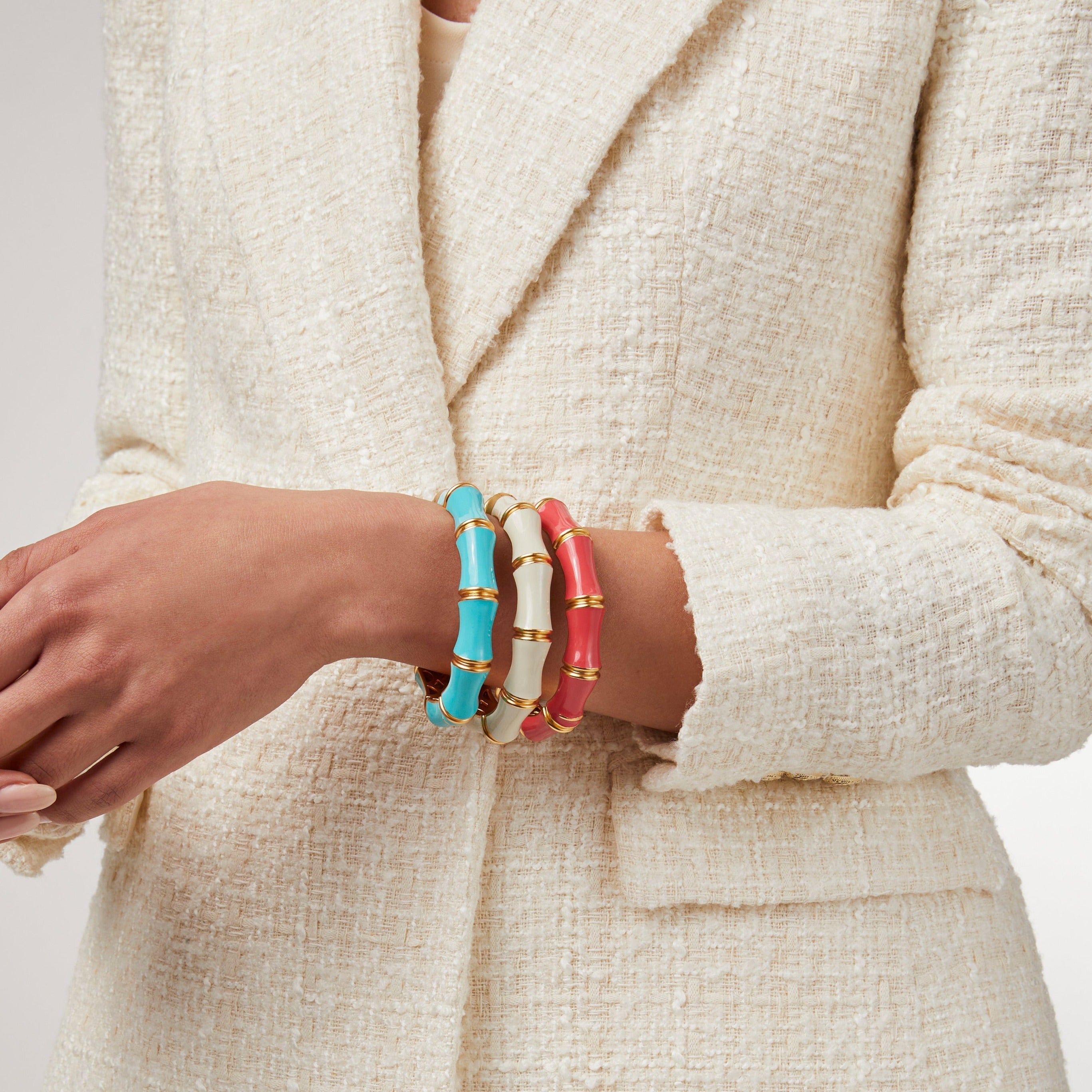 carousel, Bamboo Hinge Bangles in three different colors on model's arm