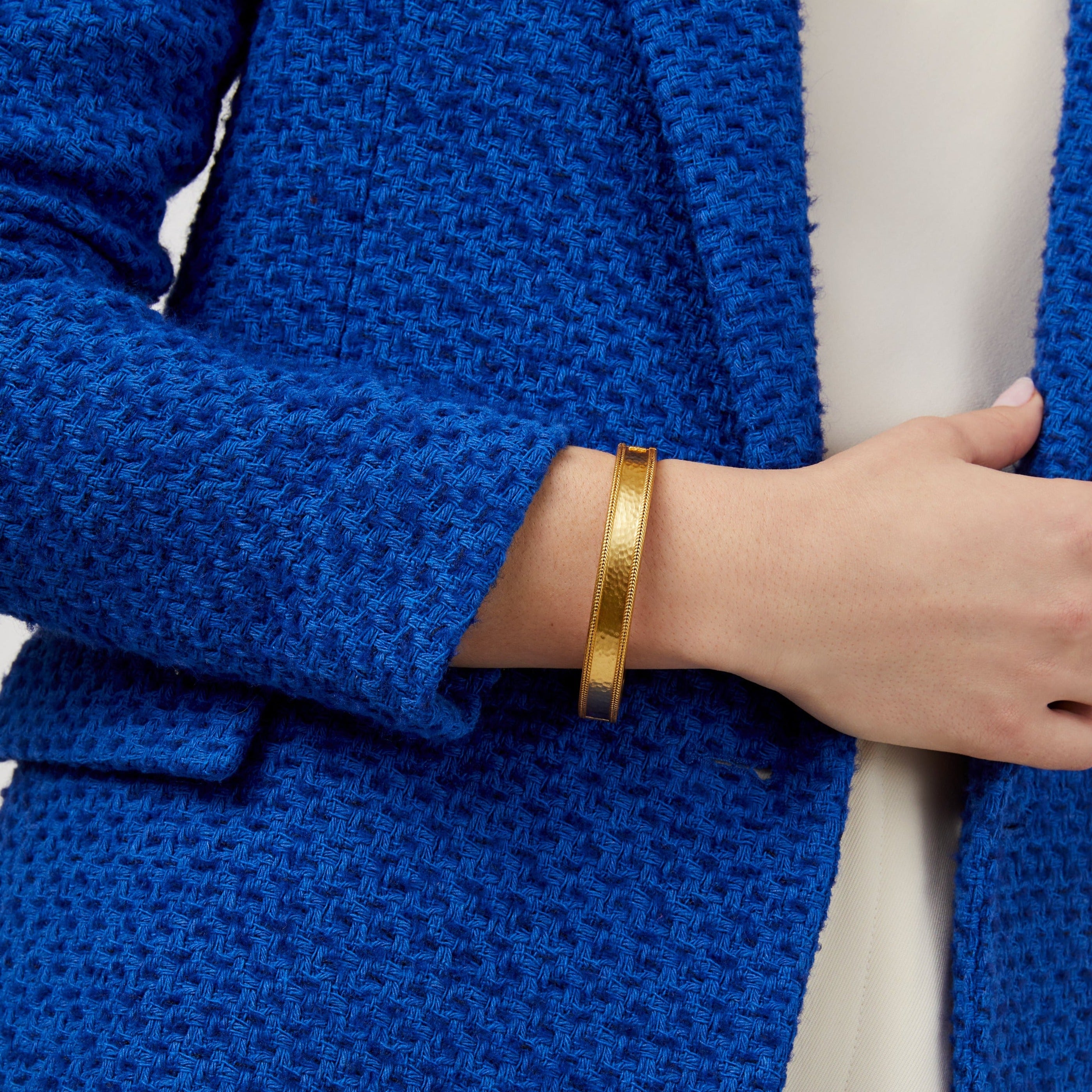 Antonia Hinge Bangle on model's arm in all gold, carousel 