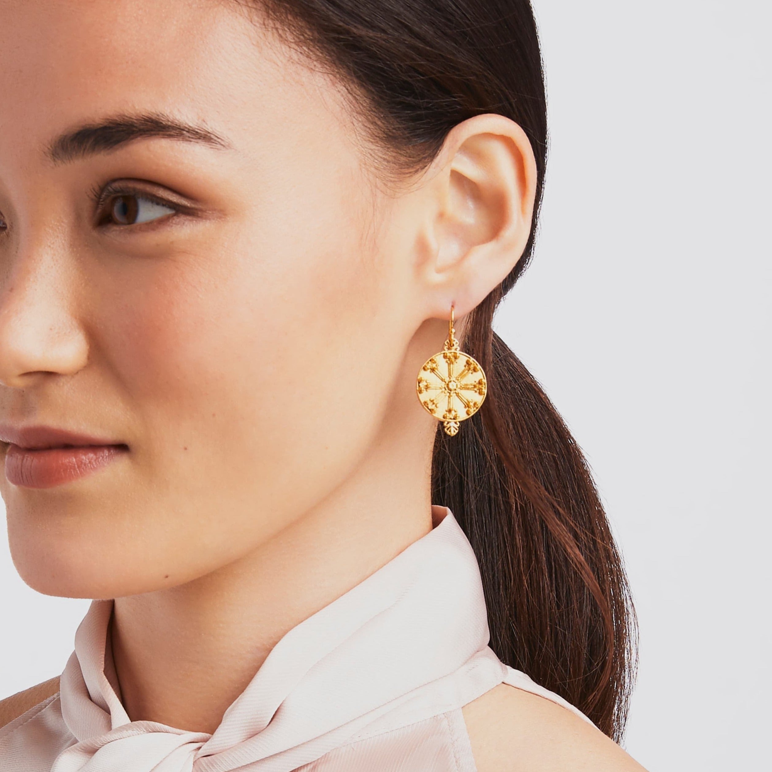 carousel, roll-over {{ Model wearing Meridian Gold Earring }}