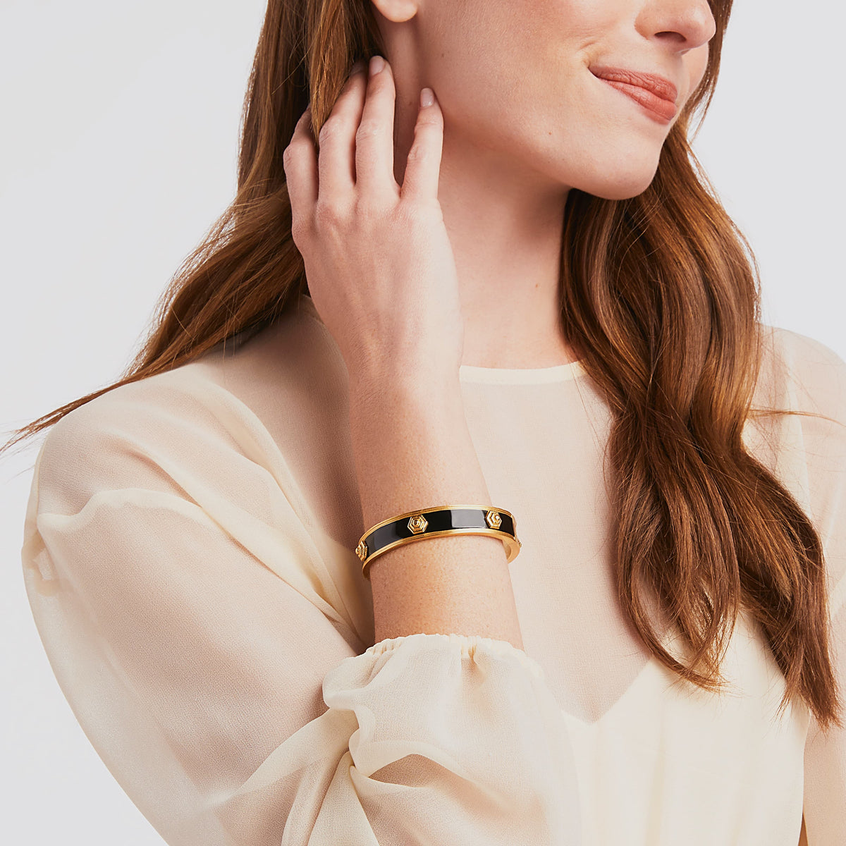 carousel, roll-over {{ PDP Model wearing Palladio Enamel Bangle in Black }}