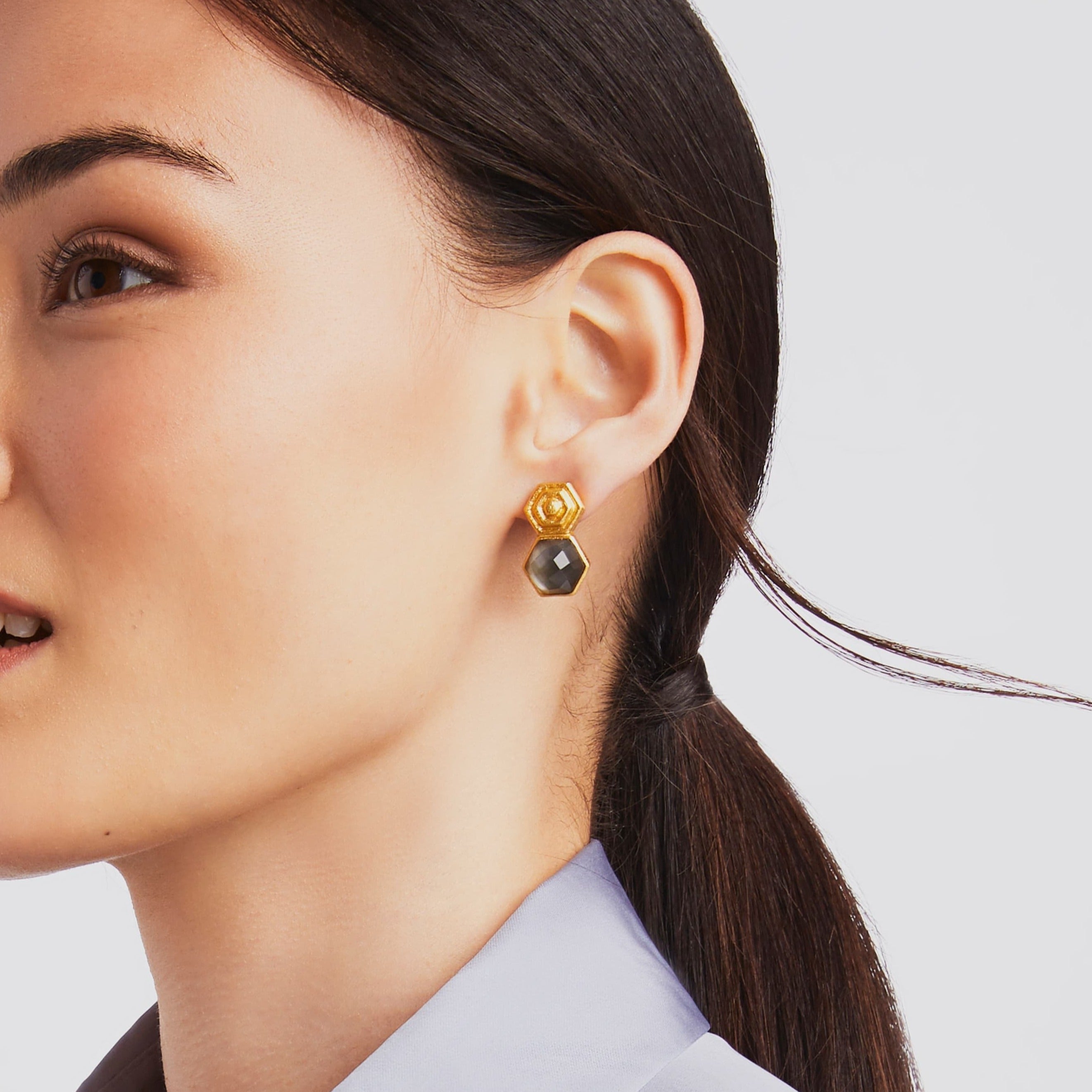 carousel, roll-over {{ PDP Model wearing Palladio Earring in Iridescent Charcoal Blue }}