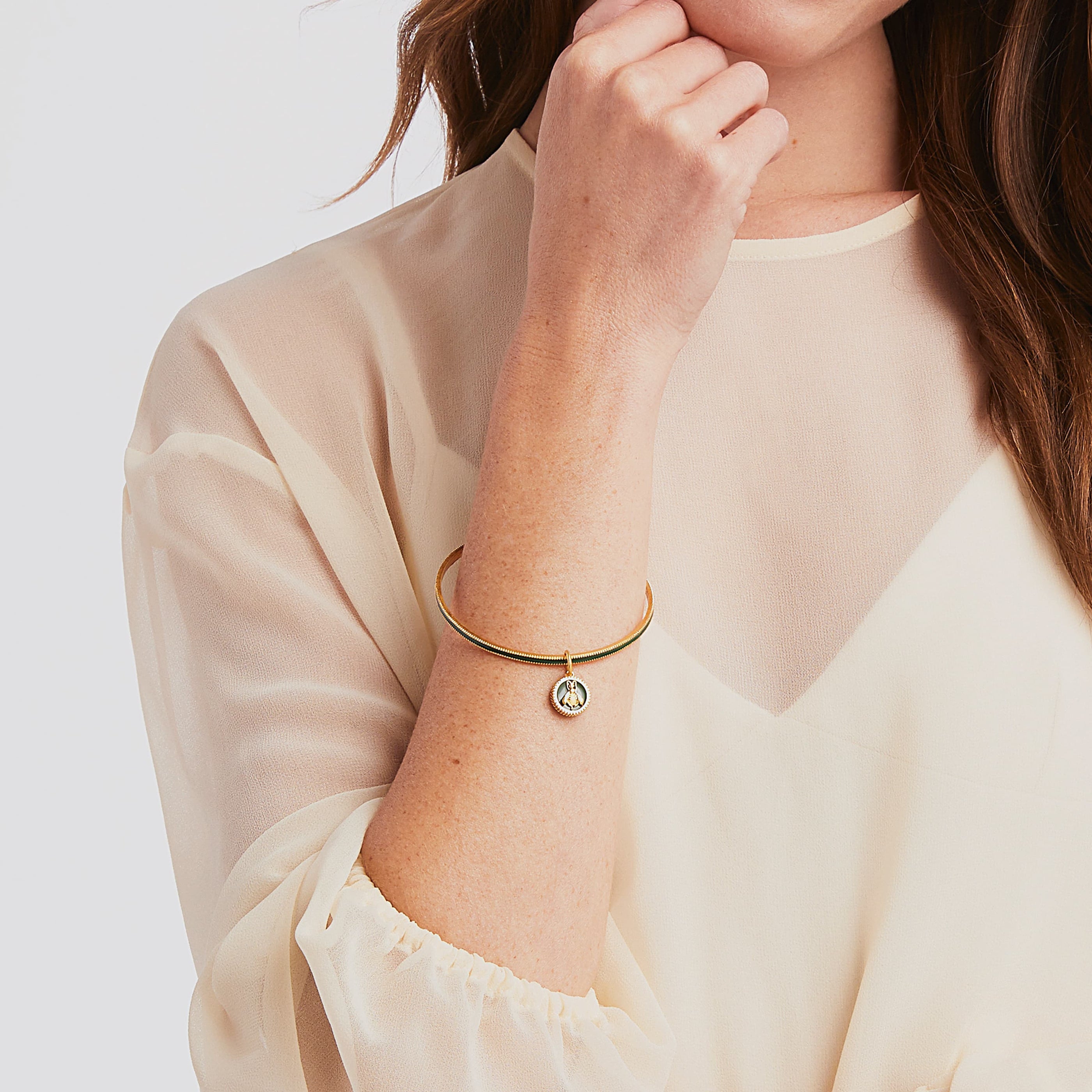 carousel, roll-over {{ Model is wearing jade green enamel }}